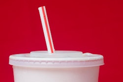 A large soft drink with a plastic straw from a McDonald's restaurant is shown in Surfside, Fla., May 24, 2018.