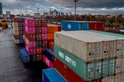 Containers are stacked at the cargo terminal in Frankfurt, Germany, Friday, Dec. 6, 2024.