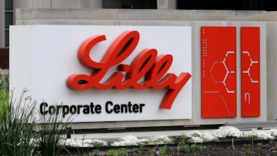 A sign for Eli Lilly & Co. appears outside their corporate headquarters in Indianapolis on April 26, 2017.