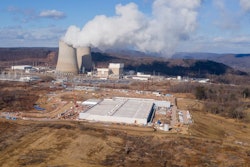 A data center owned by Amazon Web Services, front right, is under construction next to the Susquehanna nuclear power plant in Berwick, Pa., on Tuesday, Jan. 14, 2024.