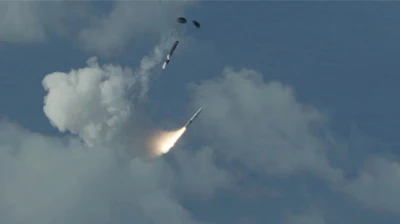 A Medium Range Ballistic Missile with a Hypersonic Target Vehicle (HTV) - 1 front end is air launched from a C-17 aircraft off the coast of the Pacific Missile Range Facility, Hawaii, during Flight Test Other-40, or FTX-40, March 24, 2025.