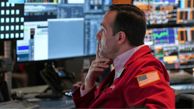 Robert Greason works on the floor at the New York Stock Exchange in New York, Thursday, April 3, 2025.