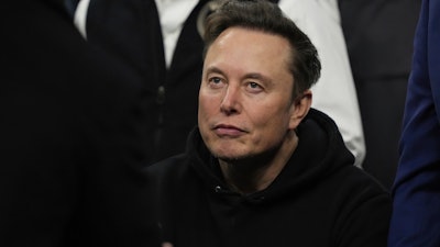 Elon Musk attends the finals for the NCAA wrestling championship, Saturday, March 22, 2025, in Philadelphia.