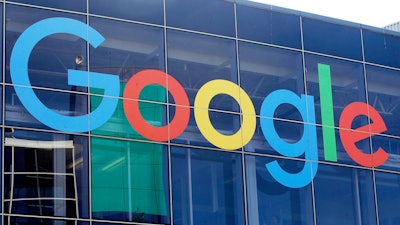 A sign is displayed on a Google building at their campus in Mountain View, Calif., Sept. 24, 2019.