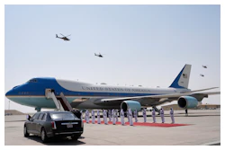 Qatar Air Force Apache gunships perform a flyover as Air Force One is ready to depart from Al Udeid Air Base, Thursday, May 15, 2025, in Doha, Qatar.