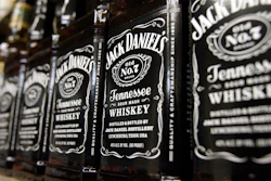 Bottles of Jack Daniel's Tennessee Whiskey line the shelves of a liquor outlet in Montpelier, Vt., Dec. 5, 2011.