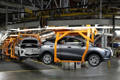 Vehicles move along the 2023 Chevrolet Bolt EV and EUV assembly line at the General Motors Orion Assembly June 15, 2023, in Lake Orion, Mich.