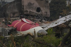 Parts of an Air India plane that crashed on Thursday are seen on top of a building in Ahmedabad, India, Friday, June 13, 2025.