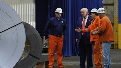 President Donald Trump talks to workers as he tours U.S. Steel Corporation's Mon Valley Works-Irvin plant, Friday, May 30, 2025, in West Mifflin, Pa.