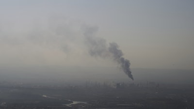Smoke billows after an Iranian missile struck an oil refinery in Haifa, northern Israel, early Monday, June 16, 2025.