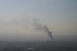 Smoke billows after an Iranian missile struck an oil refinery in Haifa, northern Israel, early Monday, June 16, 2025.