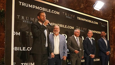 Eric Trump, Don Hendrickson, Eric Thomas, Patrick O'Brien and Donald Trump Jr., left to right, participate in the announcement of Trump Mobile, in New York's Trump Tower, Monday, June 16, 2025.