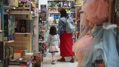 A family shops in a JaZams toy store, June 27, 2025, Princeton, N.J.