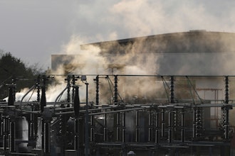 Smoke rises from the North Hyde electrical substation, which caught fire last night, leading to the closure of the Heathrow Airport, in London, March 21, 2025.