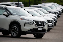 Unsold 2021 Rogue sports-utility vehicles sit on a lot at a Nissan dealership Colorado on June 27, 2021.