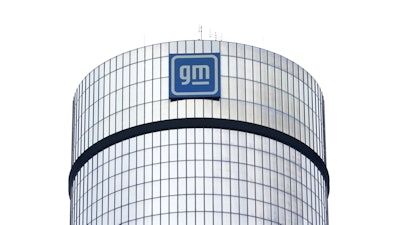 A General Motors logo is seen on a building, April 24, 2024, in Detroit.