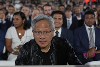 Nvidia CEO Jensen Huang arrives before President Donald Trump speaks during an AI summit at the Andrew W. Mellon Auditorium, Wednesday, July 23, 2025, in Washington.