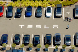 Tesla vehicles line a parking area at the company's Fremont, Calif., factory on Tuesday, Aug. 5, 2025.