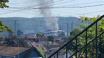 This image provided by Amy Sowers shows smoke from the U.S. Steel Clairton Coke Works, Monday, Aug. 11, 2025 in Clairton, Pa.