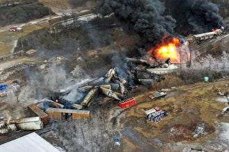 In this photo taken with a drone, portions of a Norfolk Southern freight train that derailed in East Palestine, Ohio, remain on fire, Feb. 4, 2023.