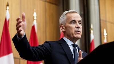 Prime Minister Mark Carney speaks during a news conference at the National Press Theatre in Ottawa, Aug. 22, 2025.
