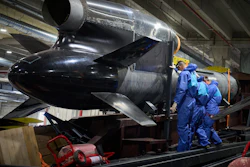 Workers inspect a Flamingo cruise missile at Fire Point's secret factory in Ukraine on Monday, Aug. 18, 2025.