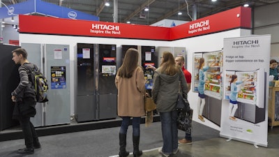 Hitachi booth at a trade show.