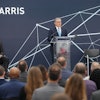 L3Harris Technologies Chair and CEO Christopher E. Kubasik speaks at the opening of the 94,000-square-foot satellite integration and test facility.
