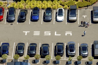 Tesla vehicles line a parking area at the company's Fremont, Calif., factory on Tuesday, Aug. 5, 2025.
