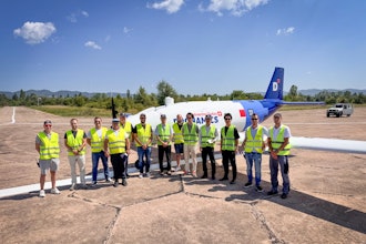 Kawasaki Motors and Dronamics teams in front of the Black Swan UAV in Sofia, Bulgaria
