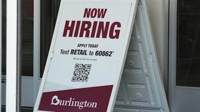 A 'Now Hiring' sign at a retail store in Schaumburg, Ill., Sept. 18, 2025.