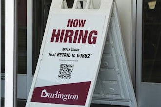 A 'Now Hiring' sign at a retail store in Schaumburg, Ill., Sept. 18, 2025.