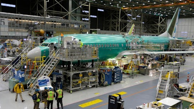 The second Boeing 737 MAX airplane being built is on the assembly line in Renton, Wash., on Monday, Dec. 7, 2015.