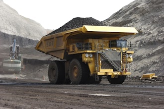In this April 4, 2013, file photo, a mining dumper truck hauls coal at Cloud Peak Energy's Spring Creek strip mine near Decker, Mont.