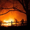 Residents fight the Marshall Fire in Louisville, Colo., Dec. 30, 2021.