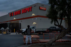 A day laborer waits for work in the parking lot of a Home Depot in the Van Nuys section of Los Angeles, Aug. 28, 2025.
