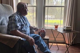 Buddy McCartney watches hundreds of trucks pass by his home in Holly Ridge, La., on their way to what will become Meta's largest data center, Monday, Aug. 18, 2025.