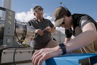 Firehawk technicians set up rocket equiptment.