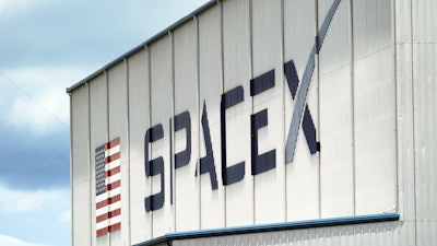 A SpaceX logo is displayed on a building on May 26, 2020, at the Kennedy Space Center in Cape Canaveral, Fla.