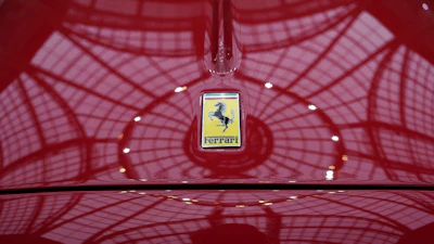 The Ferrari logo is photographed on a 1950 Oldsmobile Ferrari 166 MM Touring Barchetta displayed at the Grand Palais in Paris, Tuesday, Feb. 4, 2025.