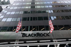 Flags fly on the front of BlackRock headquarters, Wednesday, Jan. 13, 2021, in New York.