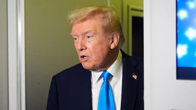 President Donald Trump speaks with reporters aboard Air Force One at Al Udeid Air Base in Doha, Qatar, Saturday, Oct. 25, 2025.