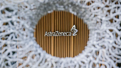 AstraZeneca corporate logo on golden circular background with textured white border