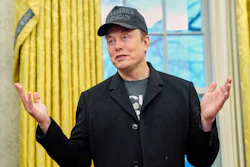 Elon Musk speaks during an event with President Donald Trump in the Oval Office at the White House, Feb. 11, 2025, in Washington.