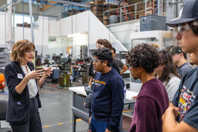 Scientific Cutting Tool's Sarah Christopher Falk speaks to a group of students.