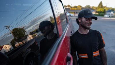 Coal miner Ethan Carper leans against his truck outside a convenience store, Wednesday, Sept. 17, 2025, in Oak Hill, W.Va.