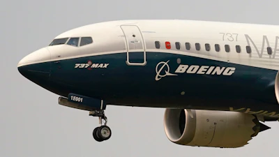 A Boeing 737 Max jet prepares to land at Boeing Field following a test flight in Seattle, Sept. 30, 2020.