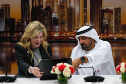 Stephanie Pope, President and CEO of Boeing Commercial Airplanes, left, and Sheikh Ahmed bin Saeed Al Maktoum, President, Dubai Civil Aviation Authority and Chairman of Emirates airlines, sign an agreement to order 65 additional Boeing 777X aircrafts during a press conference on the opening day of the Dubai Air Show, United Arab Emirates, Monday, Nov. 17, 2025.