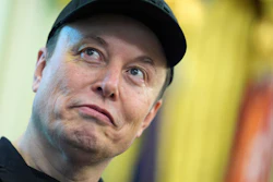 Elon Musk listens as President Donald Trump speaks during a news conference in the Oval Office of the White House, May 30, 2025, in Washington.