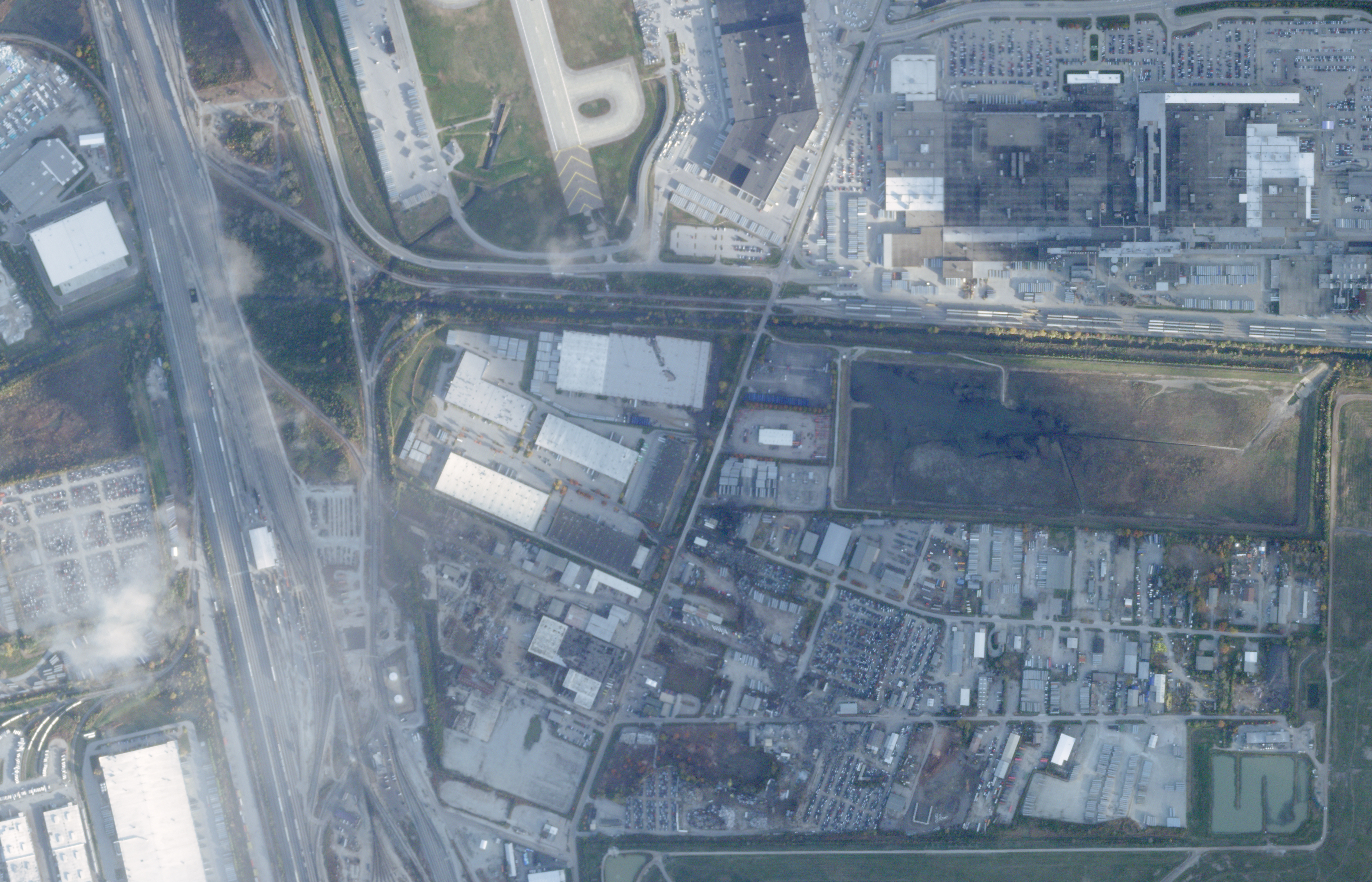 This satellite image from Planet Labs PBC shows the crash site of a UPS McDonnell Douglas MD-11 aircraft just south of Muhammad Ali International Airport, in Louisville, Ky., Monday, Nov. 10, 2025.